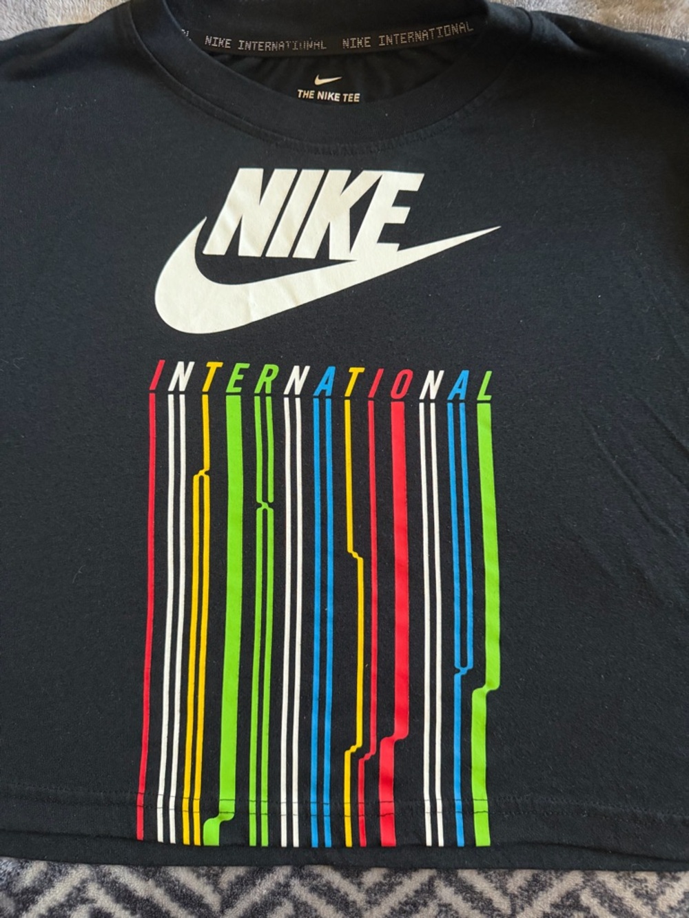 Nike Black Tee with White Logo and Printed Collar Text